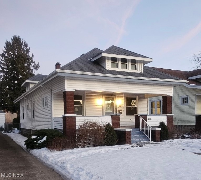 1302 Waverly Road Sandusky, OH 44870 - Photo 1 of 13 View of front of house featuring a porch