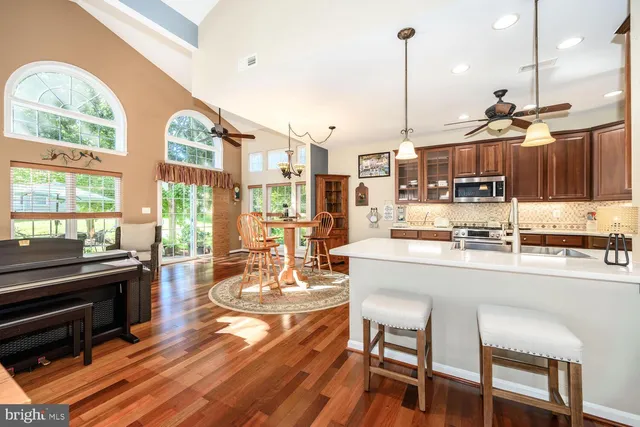 a dining table & chairs in a kitchen