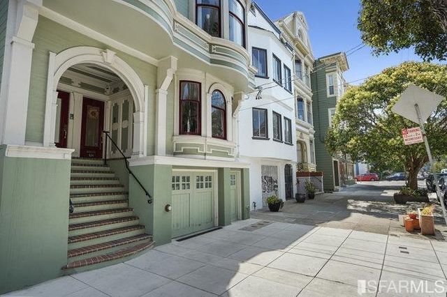 a car parked in front of a building