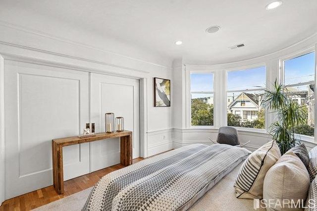a bathroom with a sink a mirror and a shower