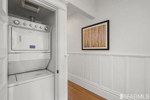 a view of a patio with table and chairs and potted plants