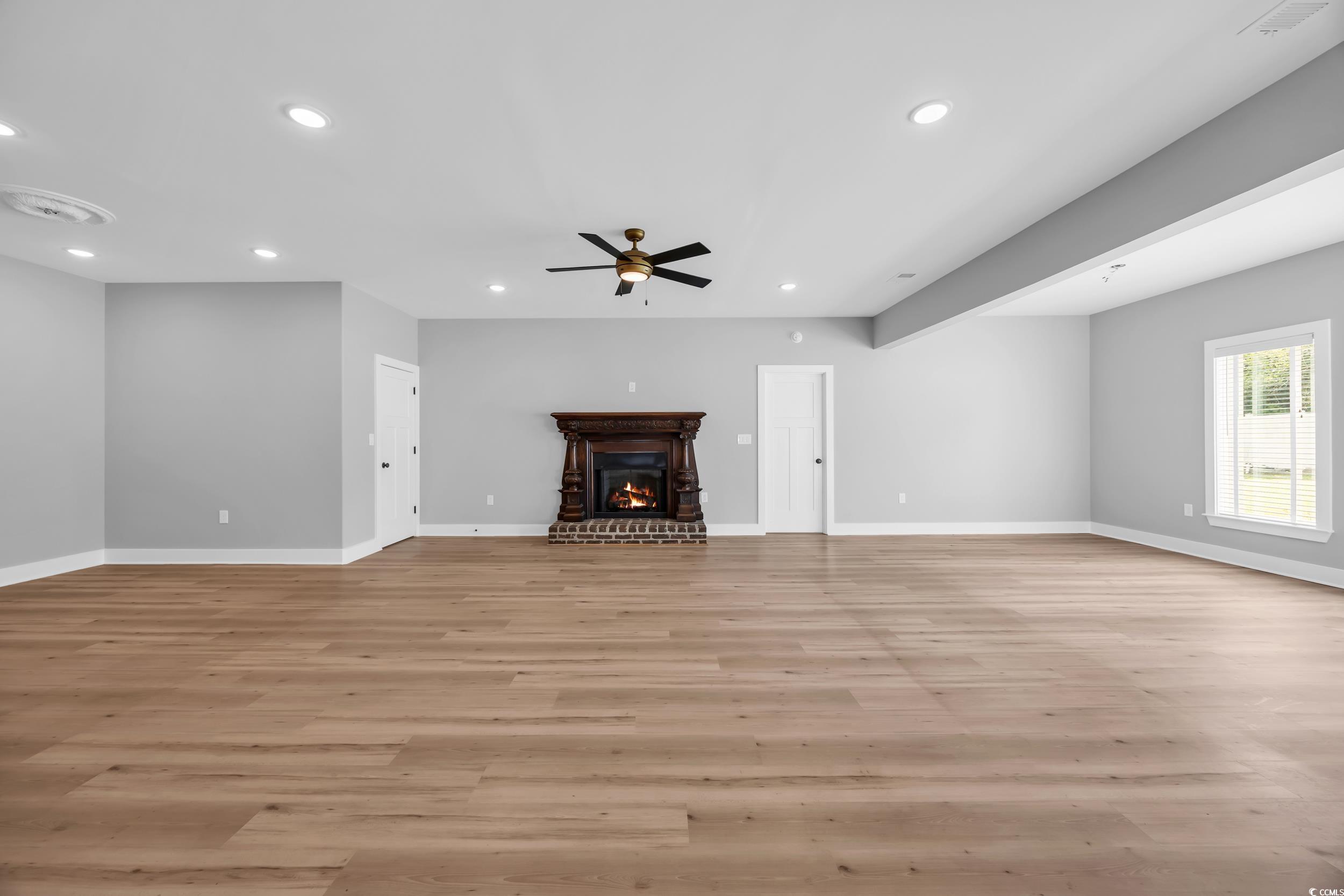 1121 Grimes Street Georgetown, SC 29440 - Photo 14 of 27 Living room with recessed lighting, wood finished floors, and ceiling fan