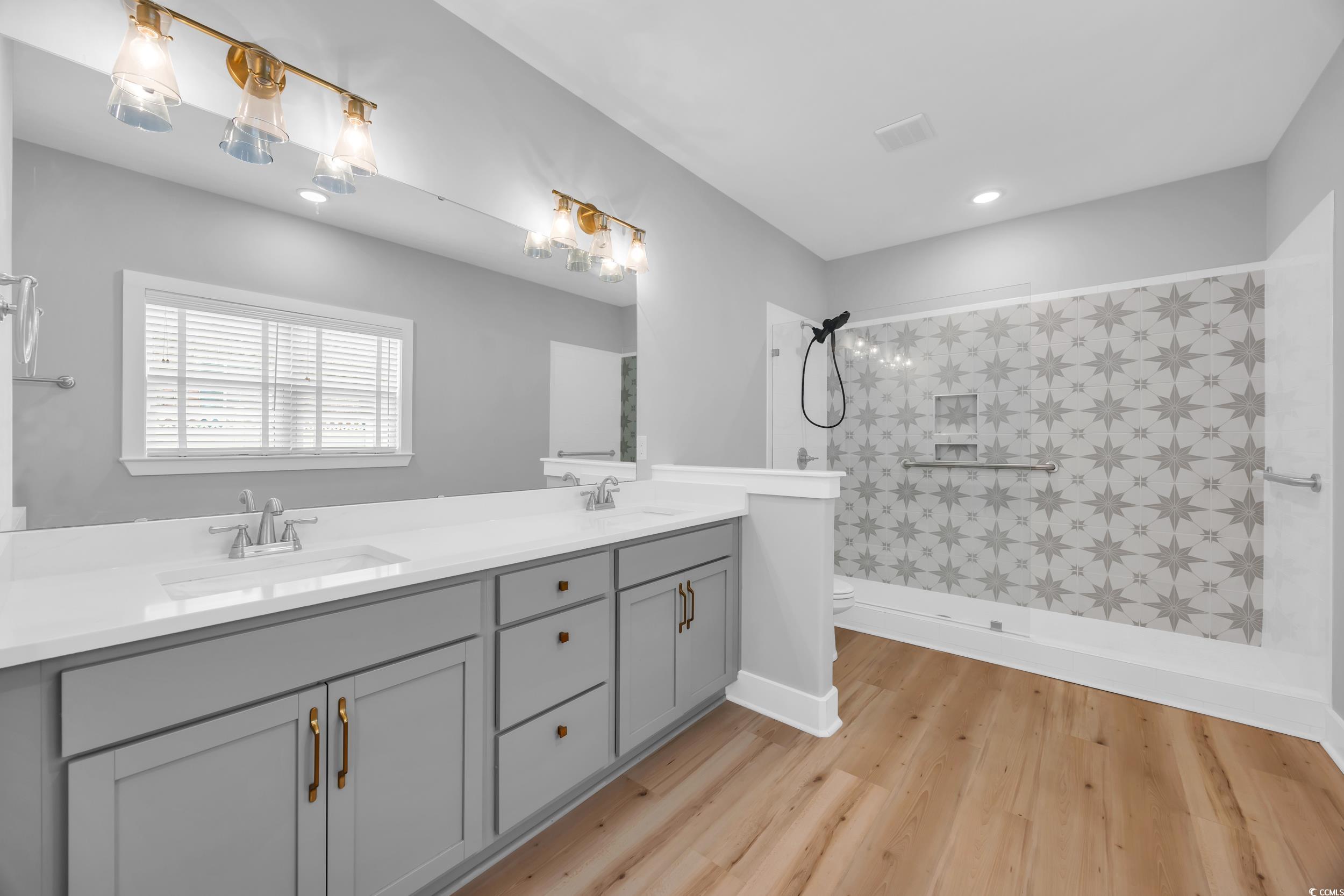 1121 Grimes Street Georgetown, SC 29440 - Photo 23 of 27 Spacious closet featuring light wood finished floors