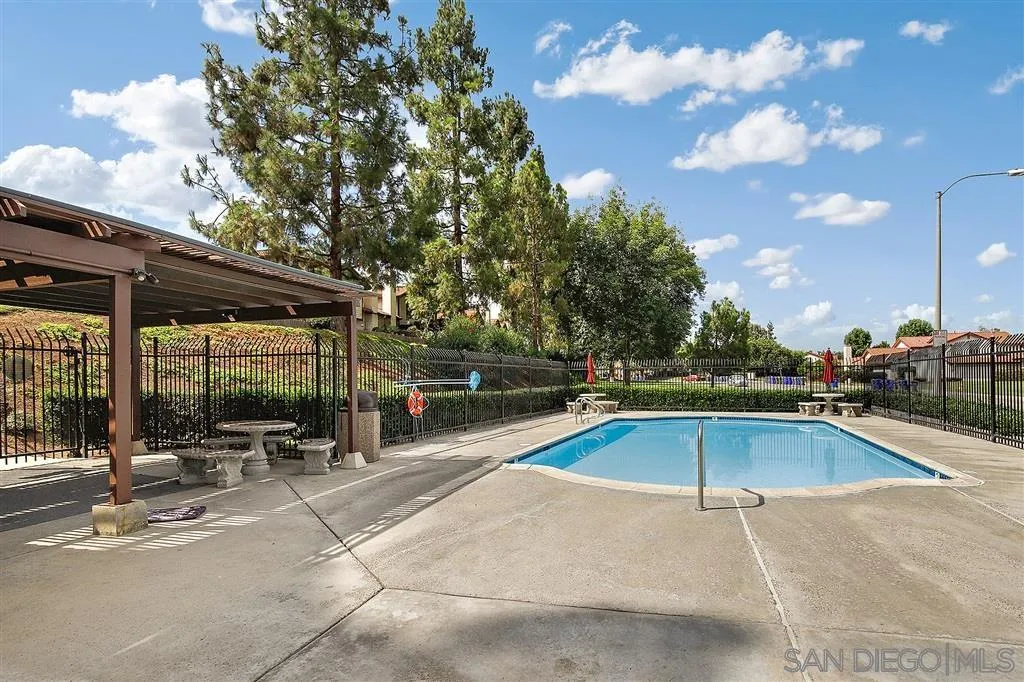 5673 Raintree Way Oceanside, CA 92057 - Photo 23 of 23 a view of a swimming pool with outdoor seating