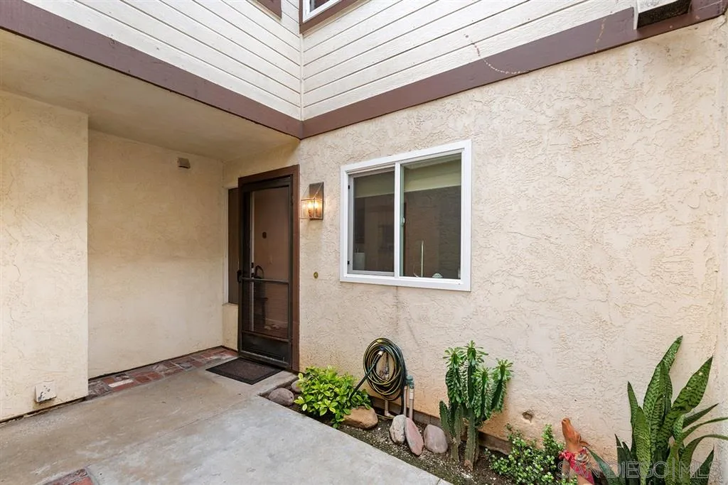 5673 Raintree Way Oceanside, CA 92057 - Photo 3 of 23 a front view of a house