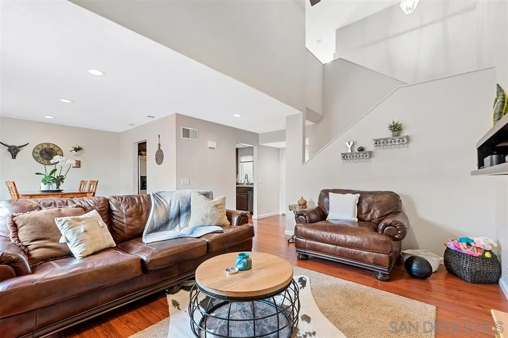 5673 Raintree Way Oceanside, CA 92057 - Photo 9 of 23 a living room with furniture and a couch