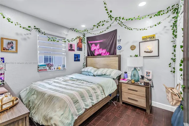 a bedroom with a bed and furniture