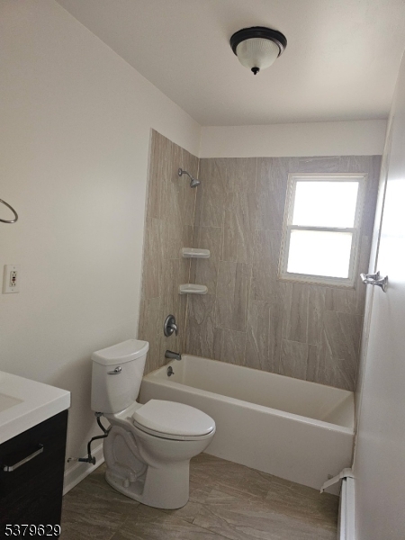 156 Highway 46, Unit 22 Rockaway, NJ 07866 - Photo 10 of 10 a bathroom with a toilet a sink and bathtub