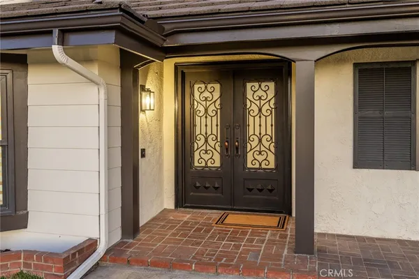 a living room with furniture or couch and a table