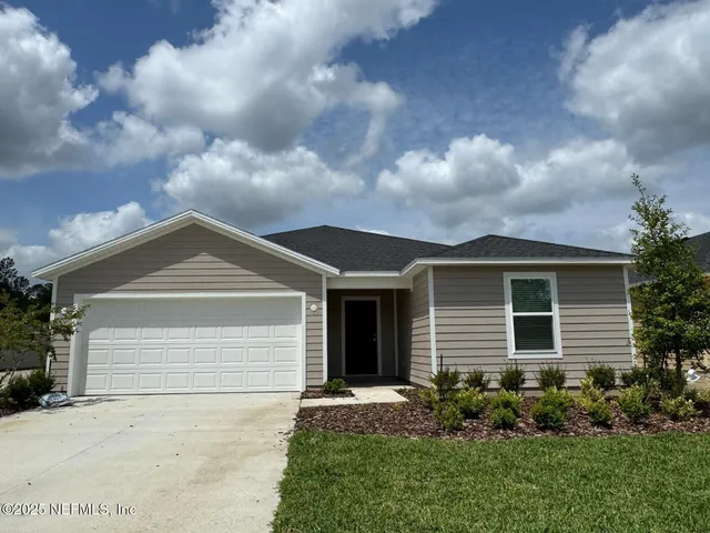 a front view of house with yard