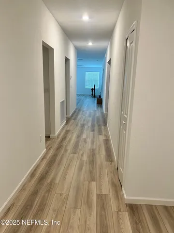 a view of a room with an empty space