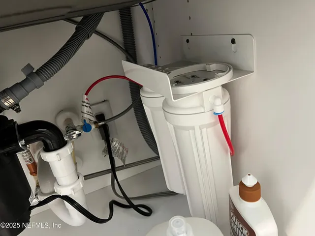 a view of a house with backyard and porch