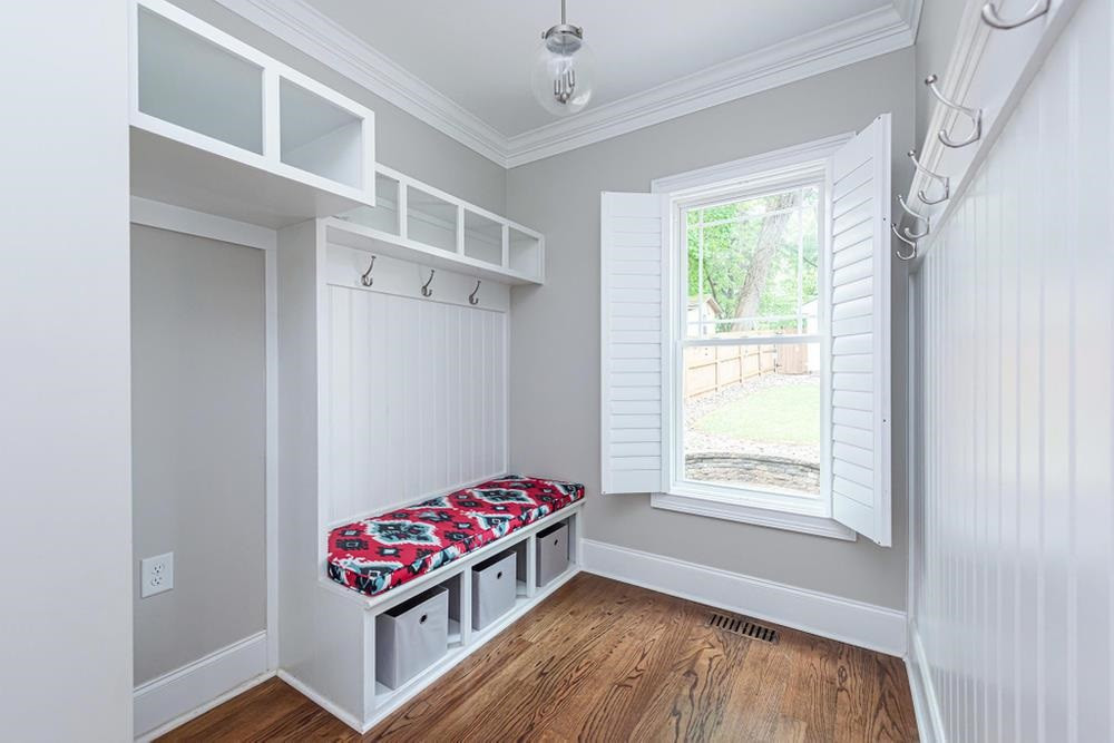 714 Edmund Street Raleigh, NC 27604 - Photo 8 of 30 Mudroom with hardwood floors, lots of natural light, and storage for backpacks, coats, shoes, and more.