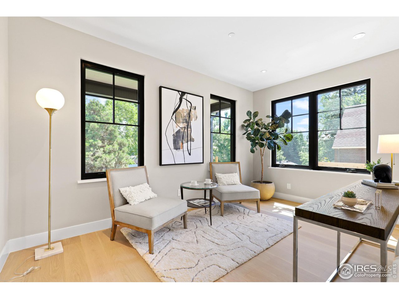 3063 7th Street Boulder, CO 80304 - Photo 12 of 39 a living room with furniture and floor to ceiling windows