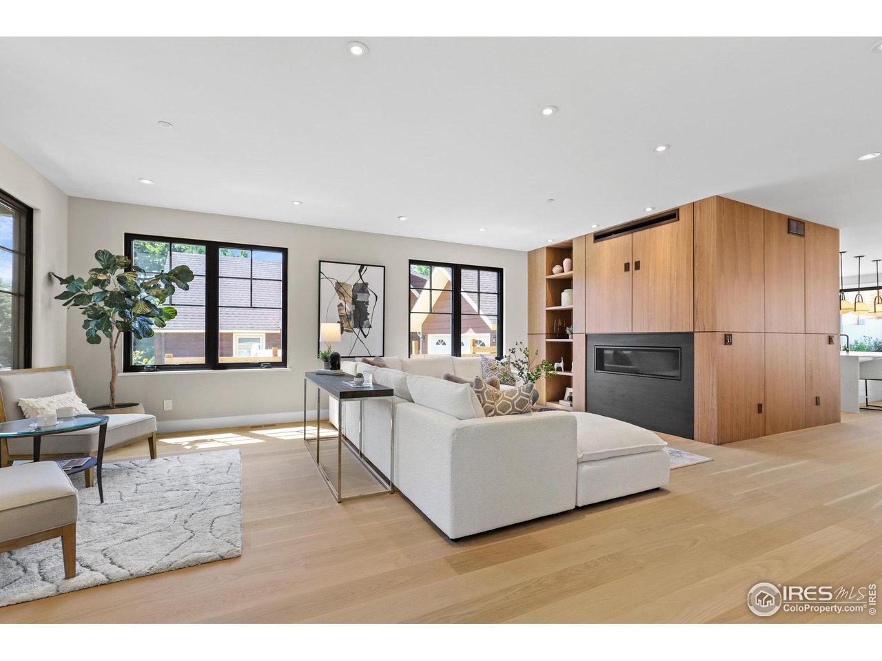 3063 7th Street Boulder, CO 80304 - Photo 2 of 39 a living room with furniture and a large window