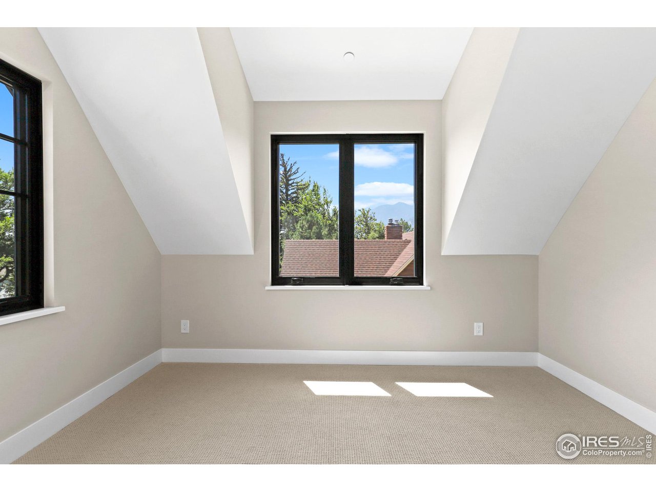 3063 7th Street Boulder, CO 80304 - Photo 22 of 39 a picture of a room that has a window