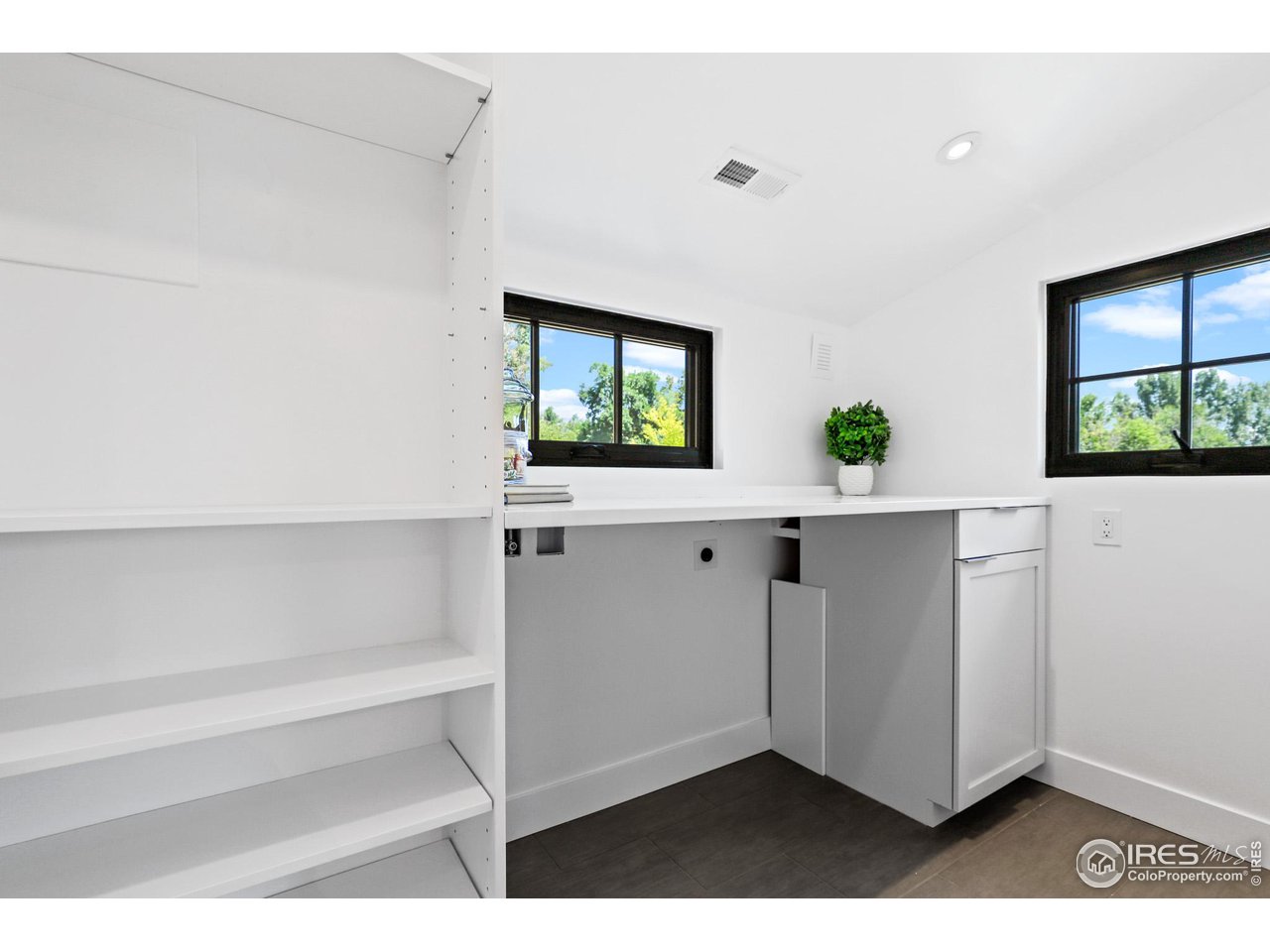 3063 7th Street Boulder, CO 80304 - Photo 24 of 39 a kitchen with cabinets and window