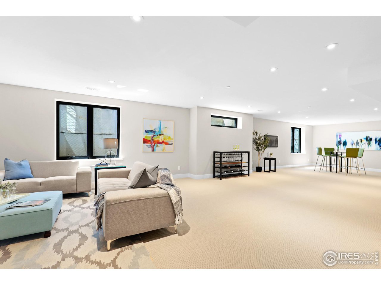 3063 7th Street Boulder, CO 80304 - Photo 27 of 39 a living room with furniture and a flat screen tv