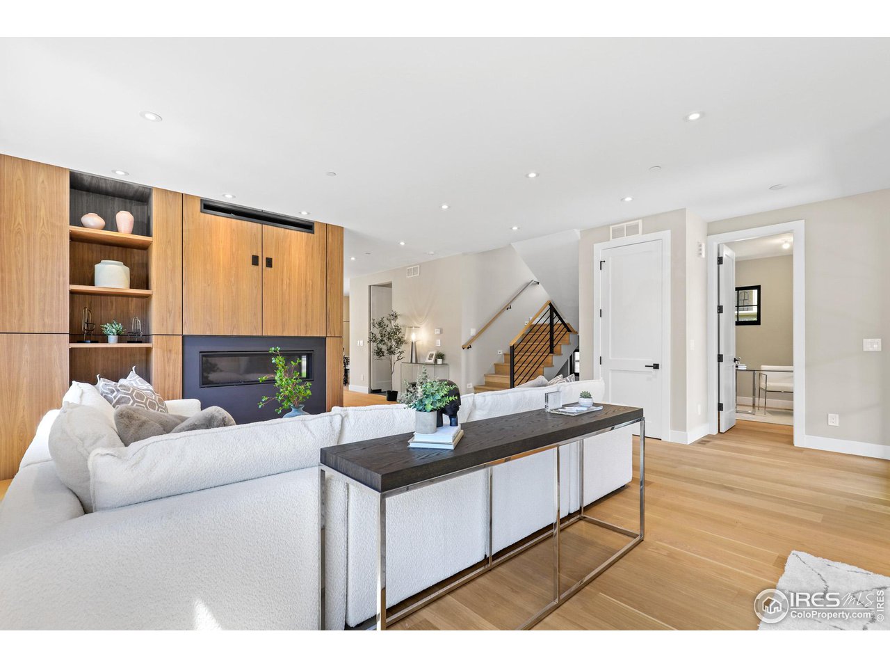 3063 7th Street Boulder, CO 80304 - Photo 10 of 39 a living room with furniture and wooden floor