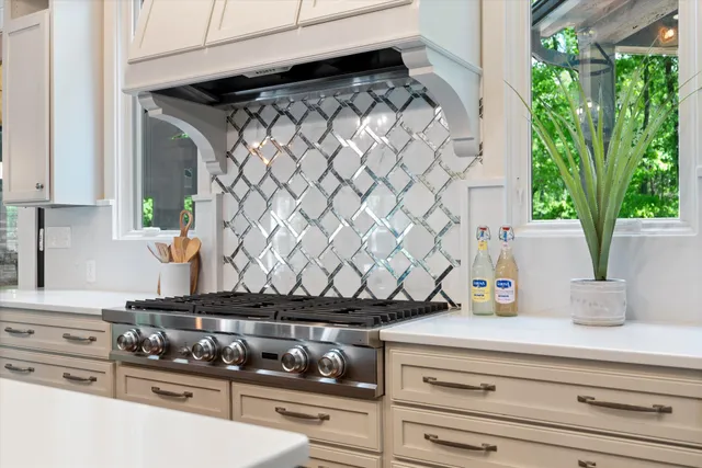 a view of a hallway with wooden floors and cabinet