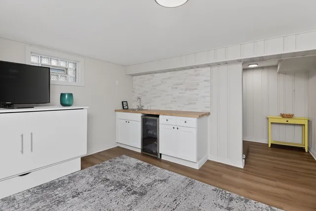 a view of workspace with wooden floor