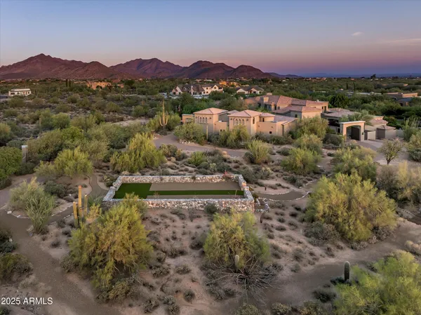 an aerial view of multiple house with outdoor space