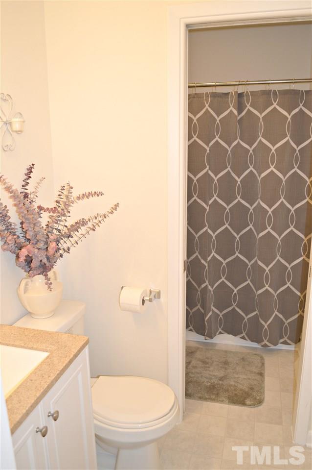 3333 Friar Tuck Road Raleigh, NC 27610 - Photo 19 of 21 a bathroom with a toilet and a shower
