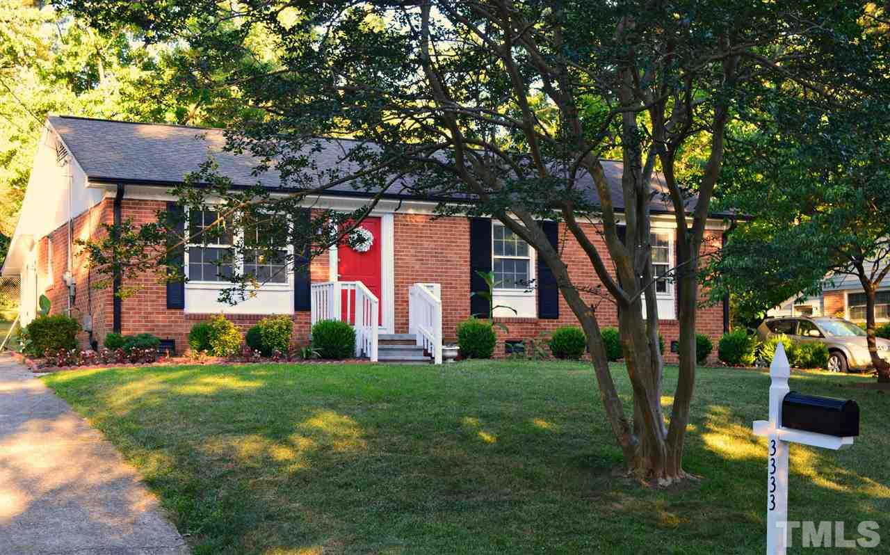 3333 Friar Tuck Road Raleigh, NC 27610 - Photo 3 of 21 a view of a house with a yard