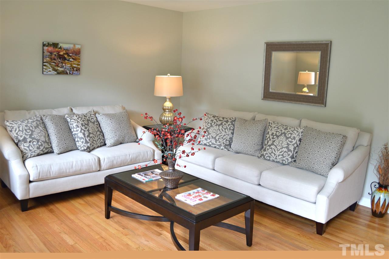 3333 Friar Tuck Road Raleigh, NC 27610 - Photo 5 of 21 a living room with furniture and a couch