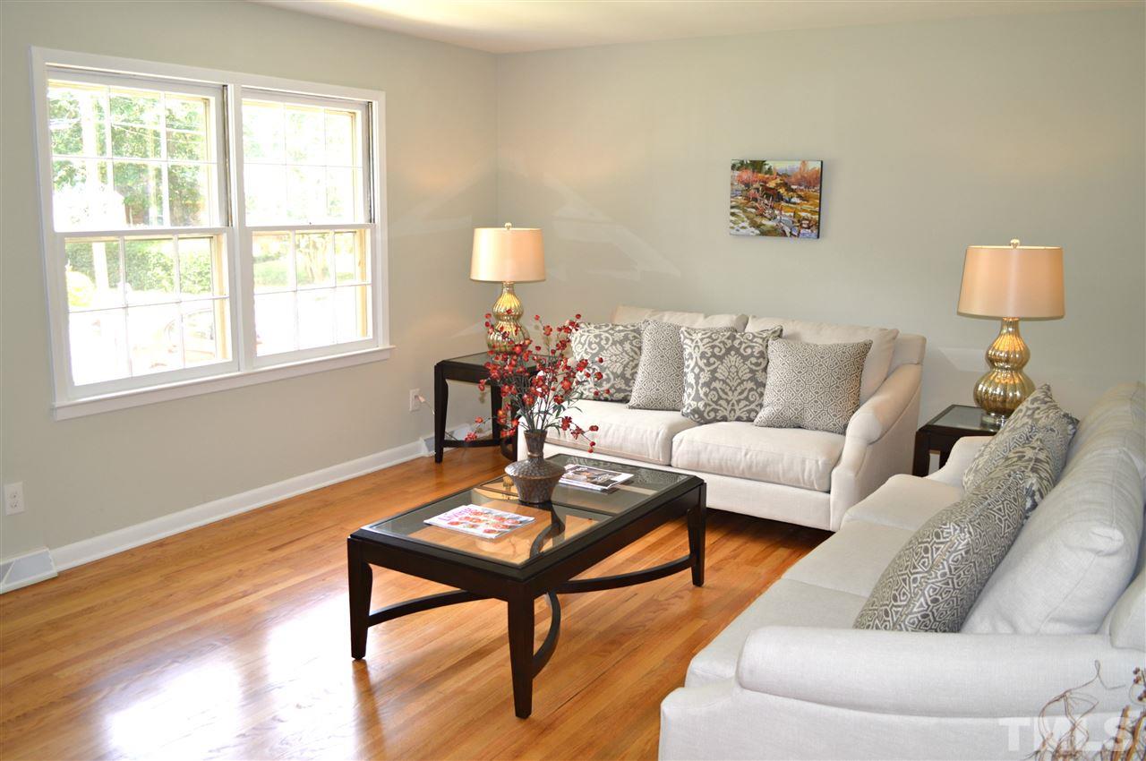 3333 Friar Tuck Road Raleigh, NC 27610 - Photo 6 of 21 a living room with furniture and a window