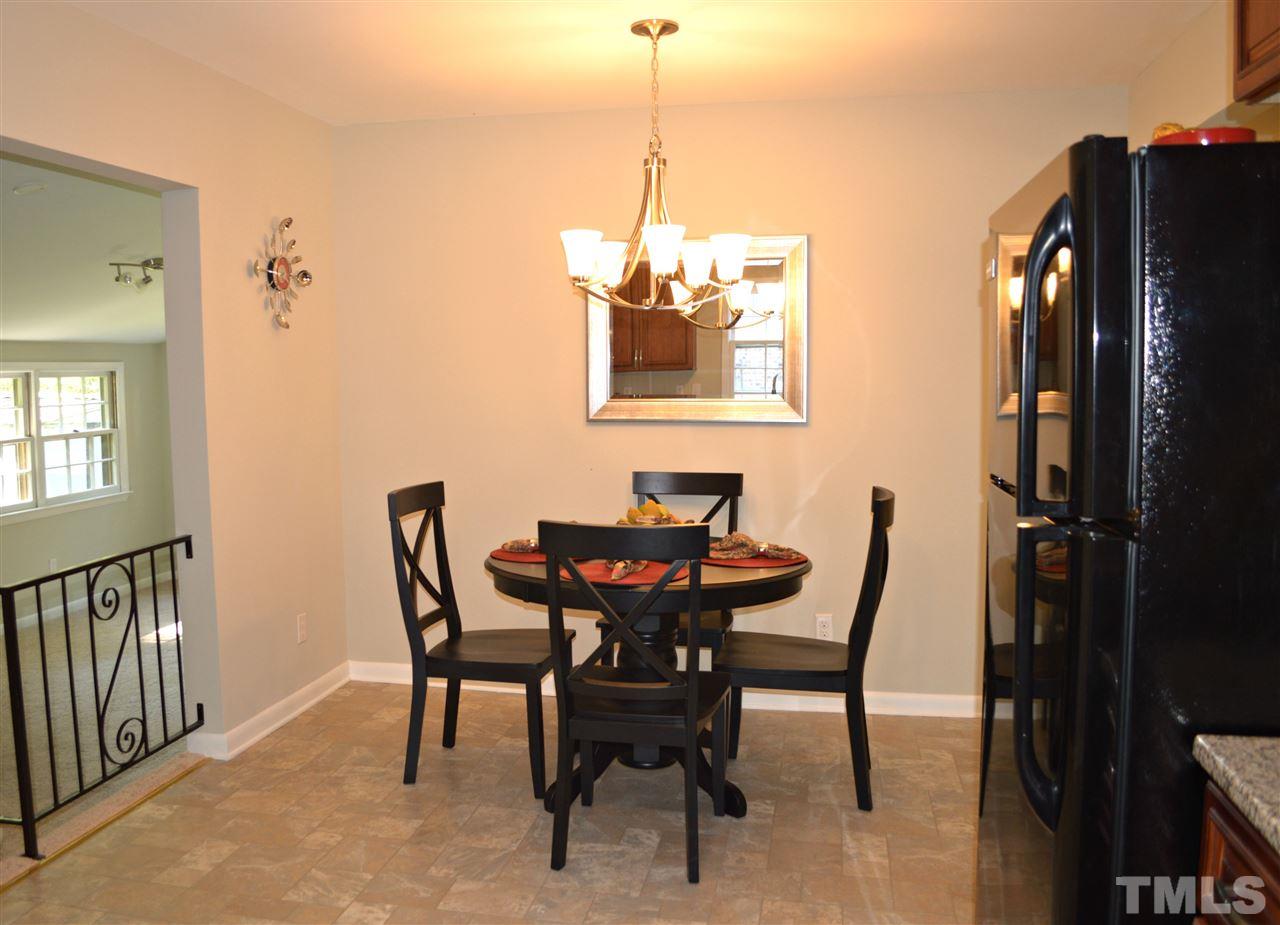 3333 Friar Tuck Road Raleigh, NC 27610 - Photo 8 of 21 a dining room with furniture and window