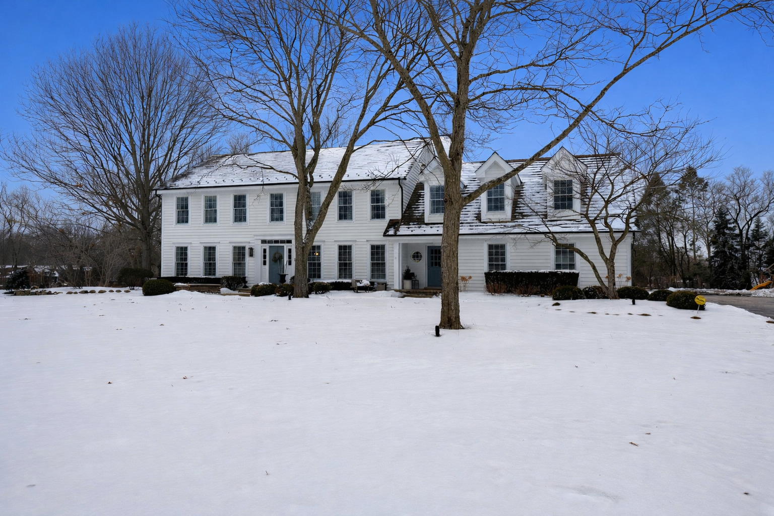 180 Weatherstone Road Barrington, IL 60010 - Photo 1 of 1 a view of white house with a snow on the road