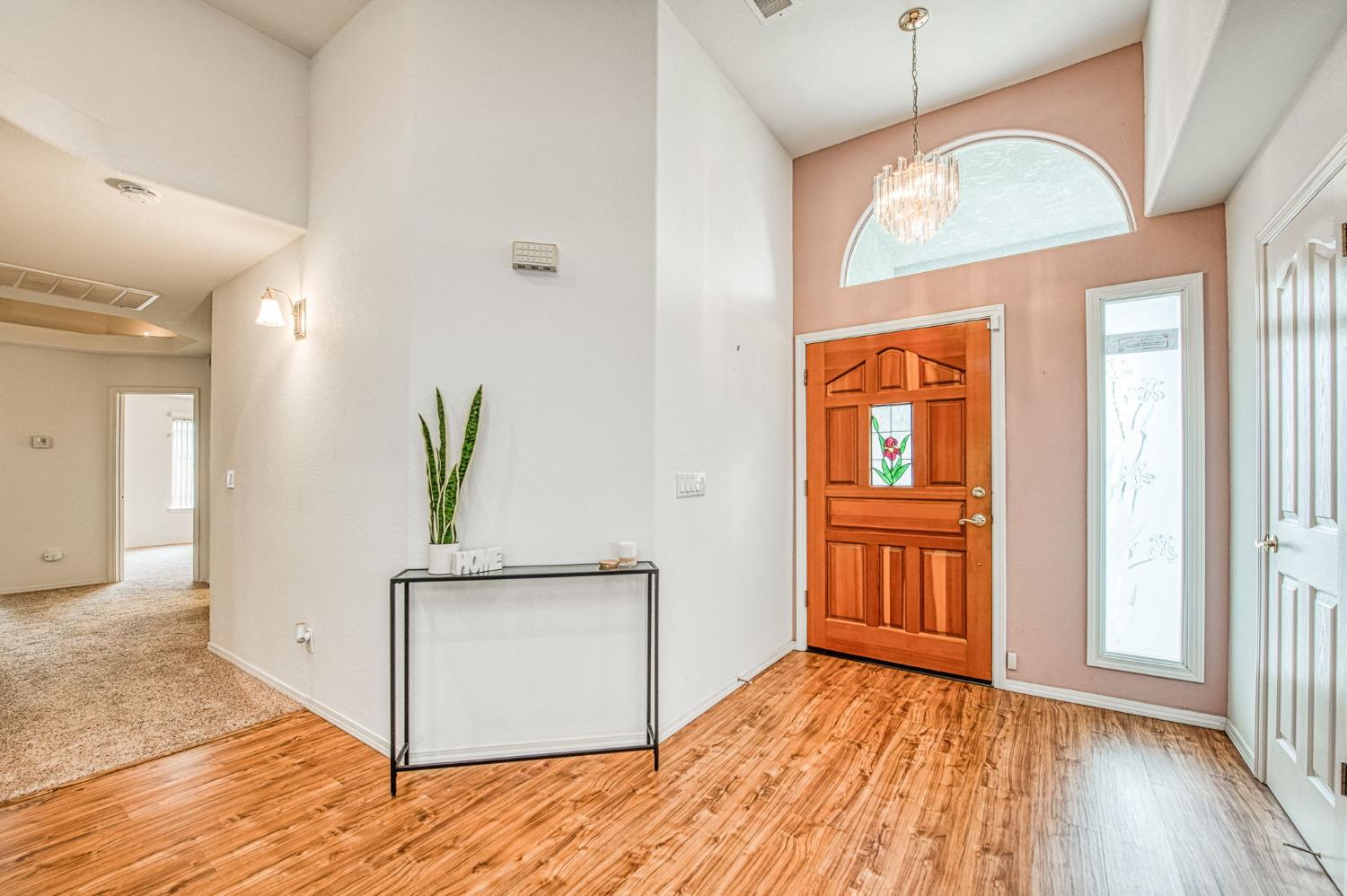 3225 Filbert Avenue Clovis, CA 93611 - Photo 3 of 36 a view of empty room with wooden floor and fan