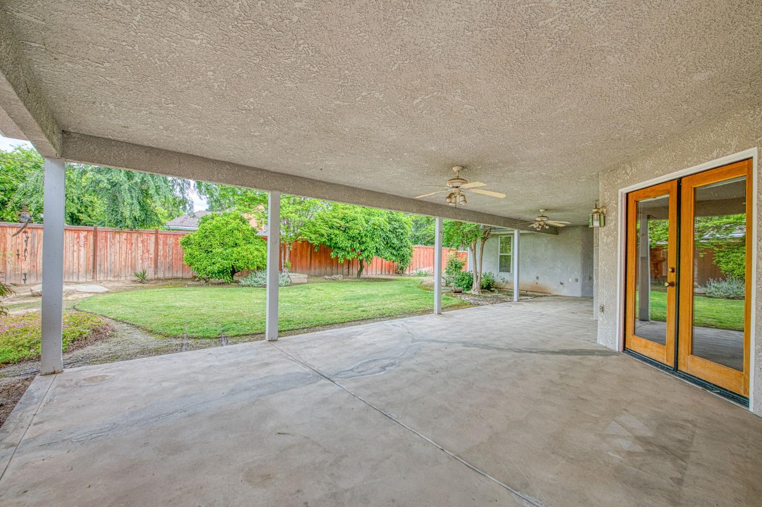3225 Filbert Avenue Clovis, CA 93611 - Photo 31 of 36 a view of a house with backyard and porch