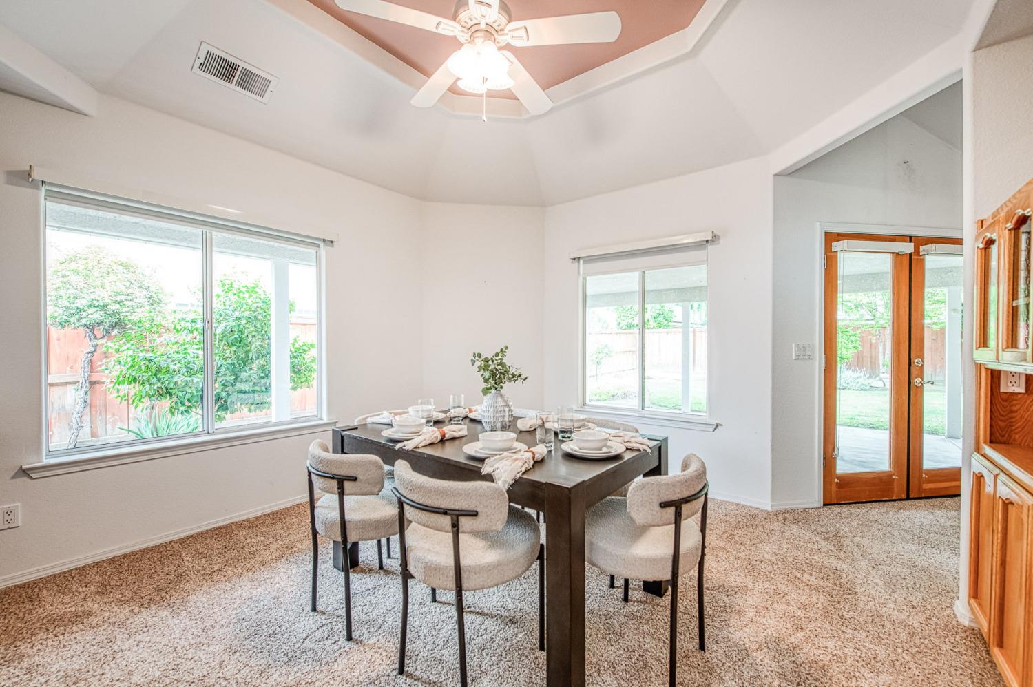 3225 Filbert Avenue Clovis, CA 93611 - Photo 10 of 36 a dining room with furniture and window