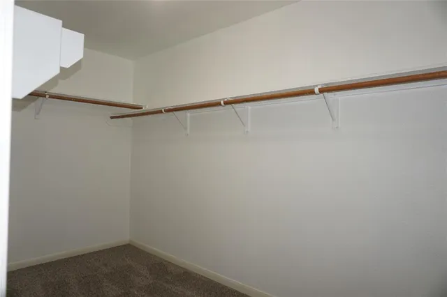a view of small space with racks on the wall