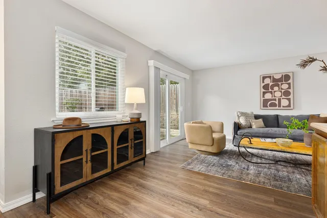 a view of a workspace with furniture