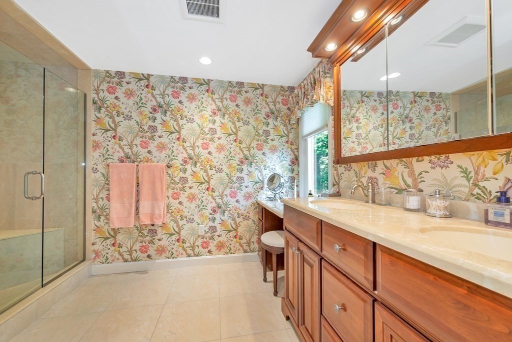 68 Potter Pond, Unit 68 Lexington, MA 02421 - Photo 18 of 28 a bathroom with a sink and a shower