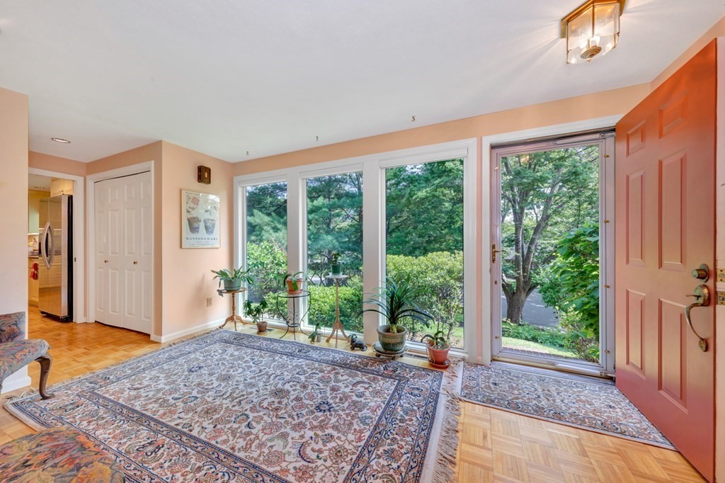 68 Potter Pond, Unit 68 Lexington, MA 02421 - Photo 3 of 28 a very nice looking room with a large window
