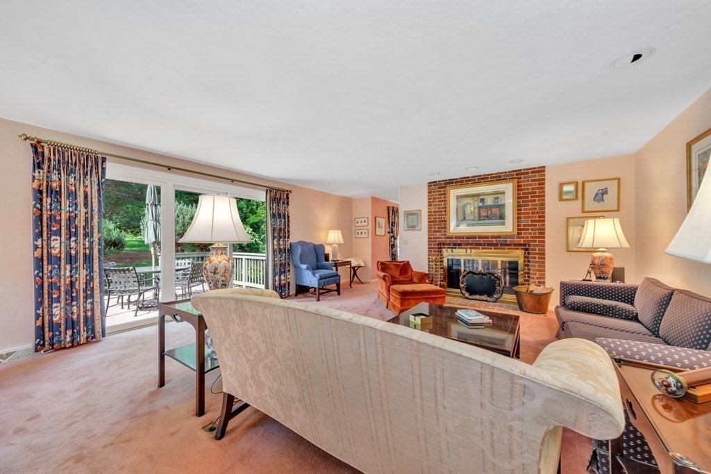 68 Potter Pond, Unit 68 Lexington, MA 02421 - Photo 6 of 28 a view of a livingroom with furniture and a window