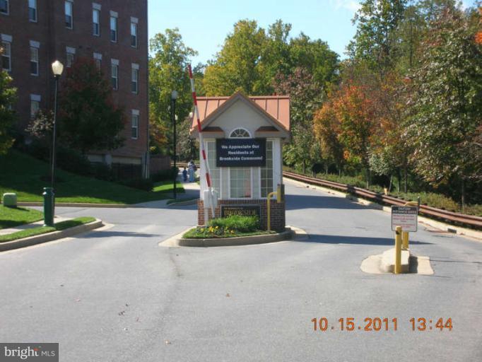 9510 Coyle Road, Unit 201 Owings Mills, MD 21117 - Photo 2 of 14 a house view with a garden space