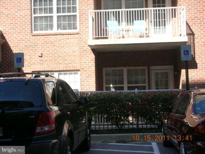 9510 Coyle Road, Unit 201 Owings Mills, MD 21117 - Photo 14 of 14 a front view of house and yard with seating space