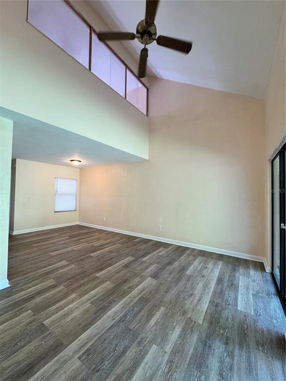 4224 Southwest 70th Terrace, Unit A Gainesville, FL 32608 - Photo 12 of 25 a view of empty room with wooden floor