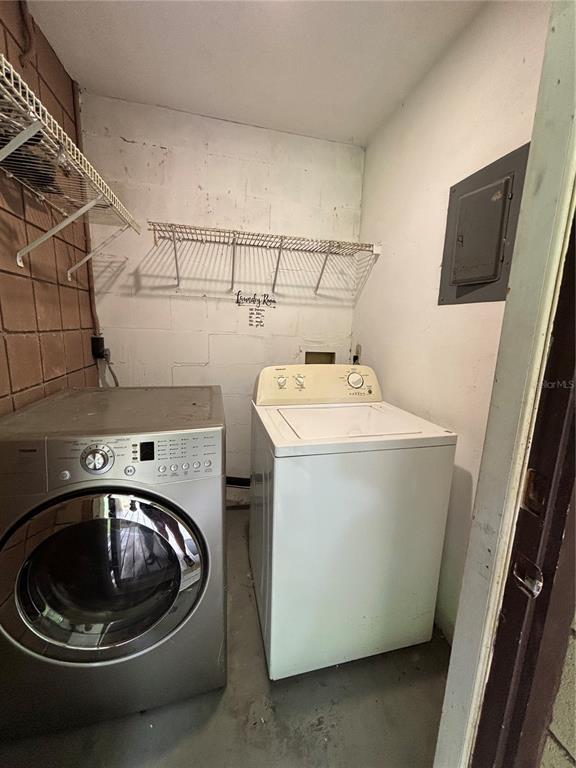 4224 Southwest 70th Terrace, Unit A Gainesville, FL 32608 - Photo 19 of 20 a utility room with a sink washer and dryer