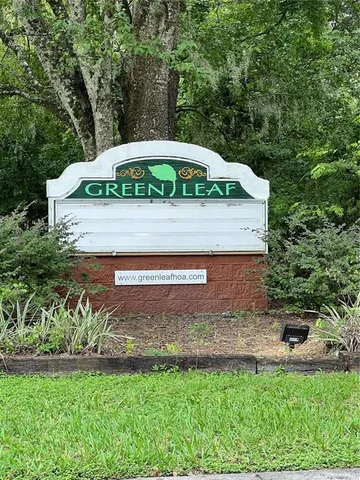 a back yard with green space