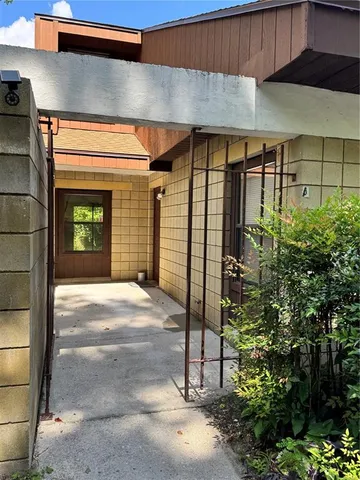 a front view of a house with a garage