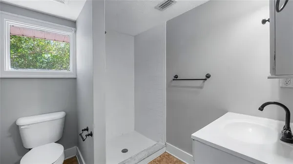 a close view of a shower in bathroom