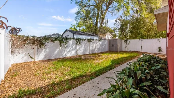a view of back yard of the house
