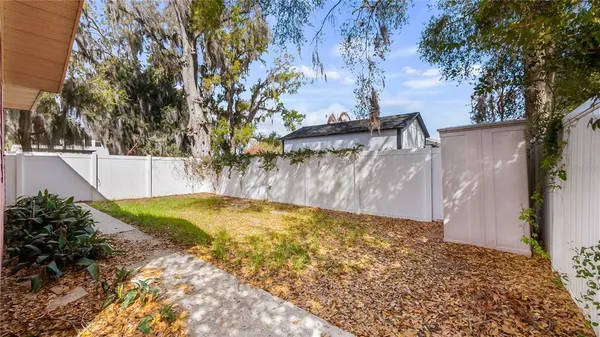 a view of swimming pool with a yard