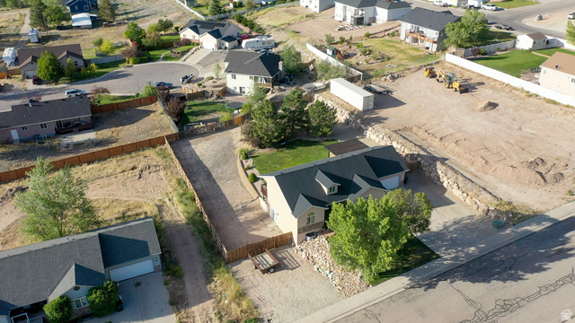 1797 Sunset Road Enoch, UT 84721 - Photo 65 of 80 Aerial perspective showcasing a residential property with surrounding undeveloped land